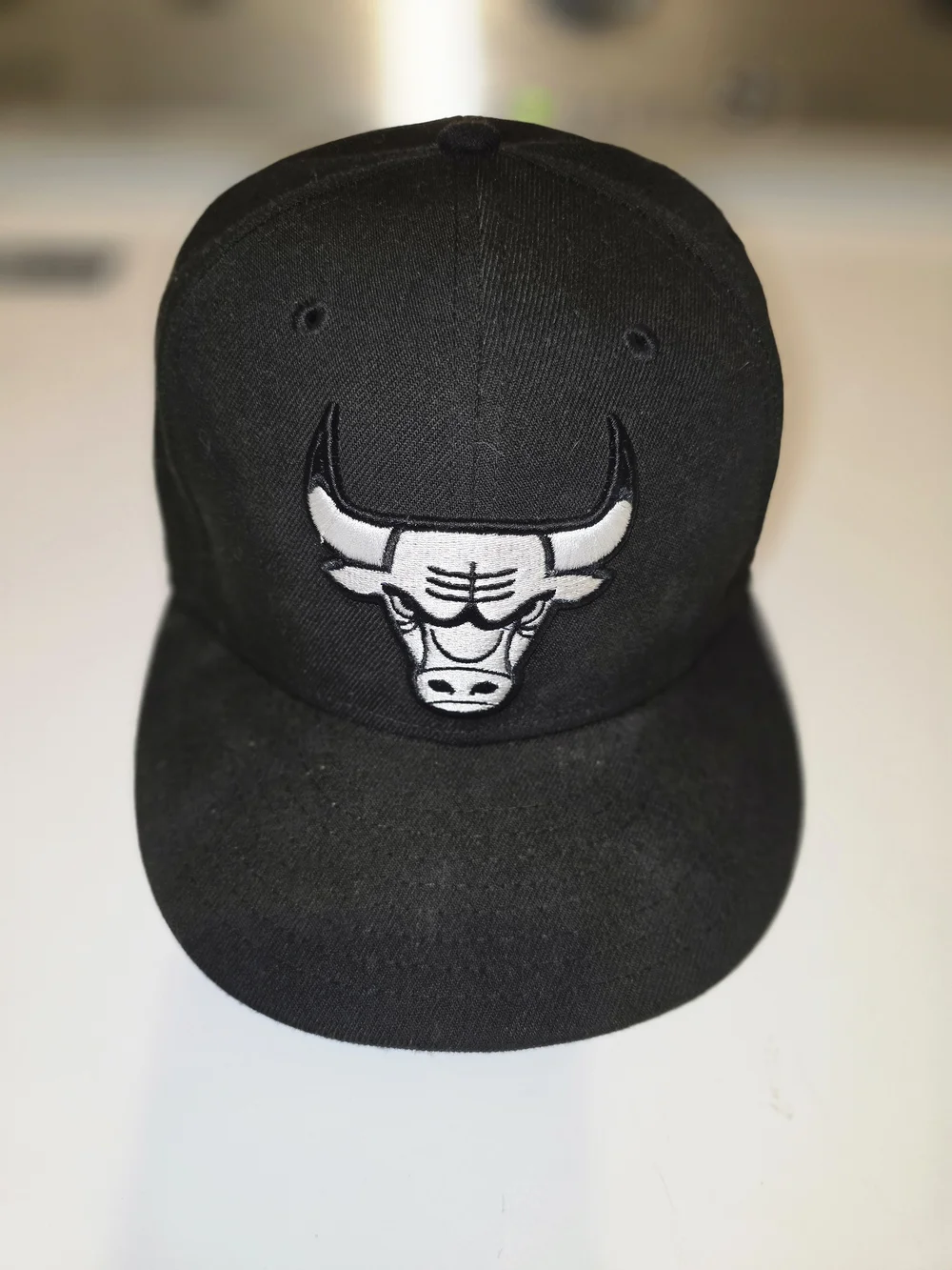 New Era Black Snapback Hat with White Bulls Patch